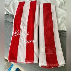 Two red striped beach towels